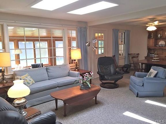 Bright living room has 2 skylights.