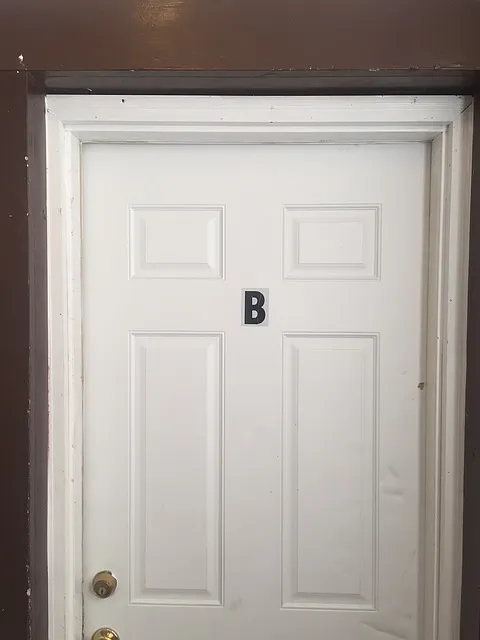 Upstairs front door. Your apartment is on the left when you get to the top of steps. Only one other apartment upstairs