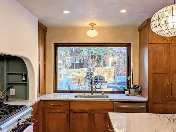 Brand new kitchen with 36" gas range and new appliances