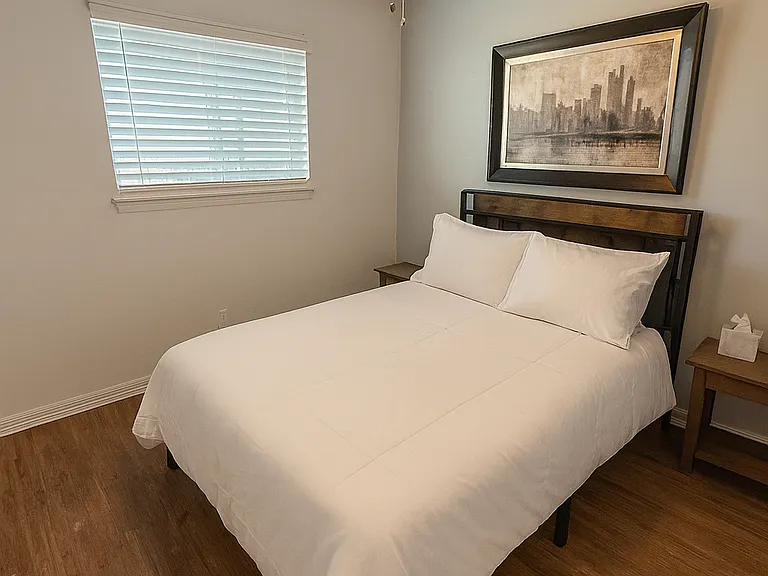Guest bedroom with 1 full-size bed and plenty of space to unwind.