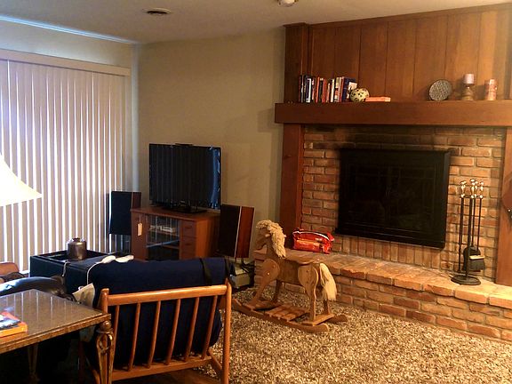 Family room with wood burning fire place