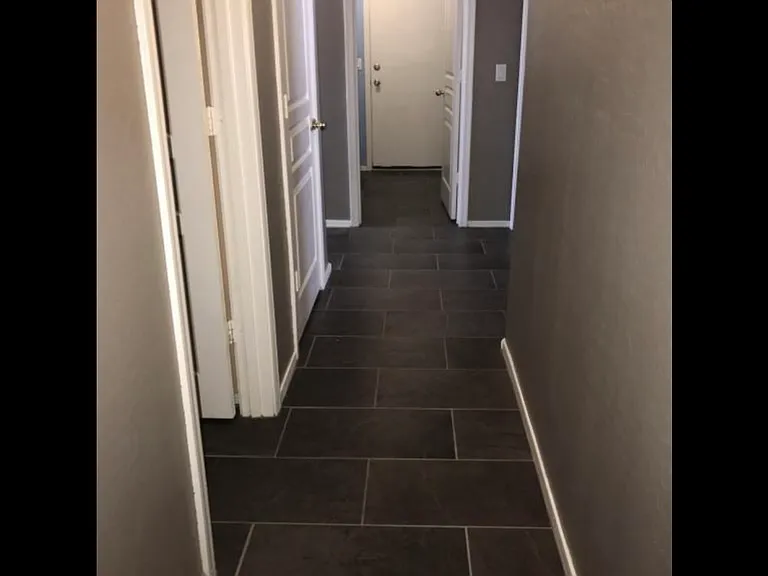Hallway leading to 3 bedrooms