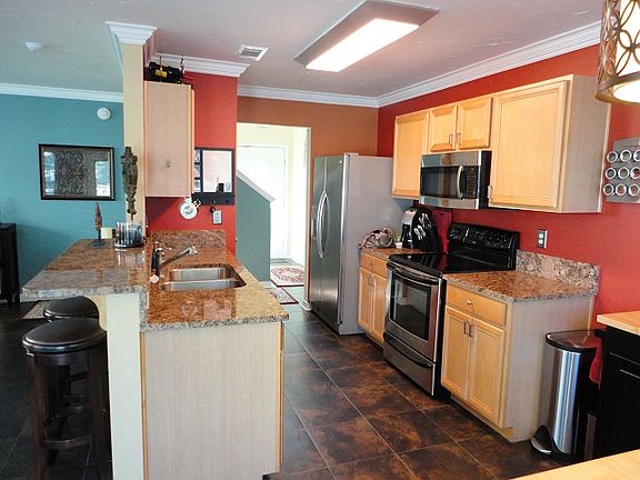 Kitchen has granite & pantry