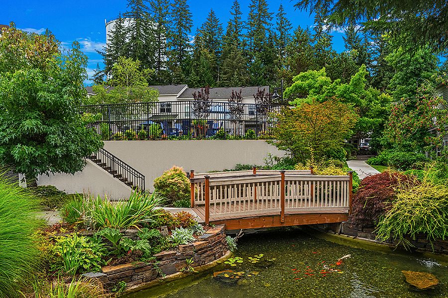 Serene koi pond and walking paths located in the community