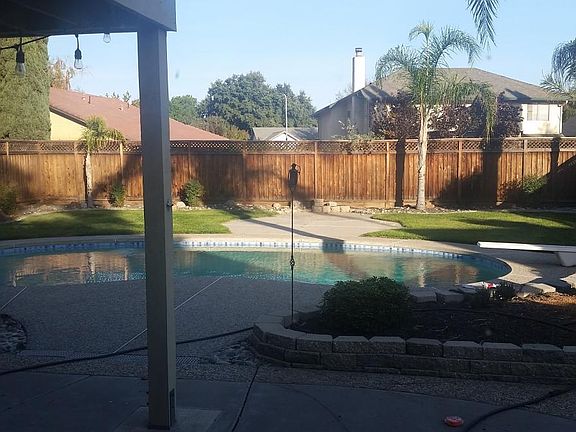 View from kitchen window of backyard