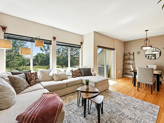 Comfortable main-level living space with easy access to private deck.