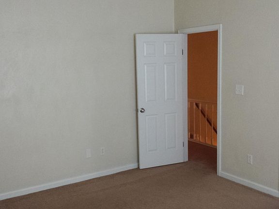 Front Master BR (14 x 16 feet) with walk-in closet at right