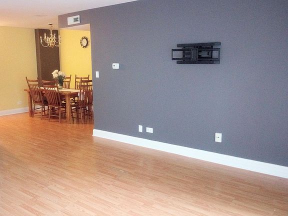 Living room and dinning area.
TV mount is already there.