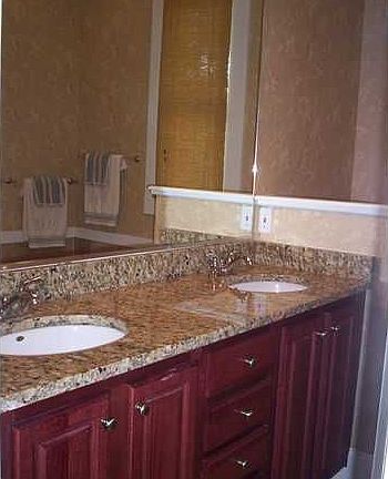 All 3 full bathrooms have high end cabinetry and granite counters.