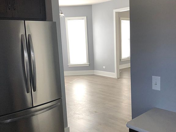 Kitchen looking into living room