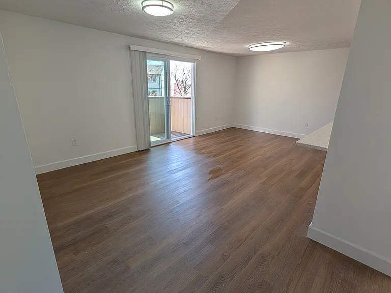 dining room and living room open plan with balcony