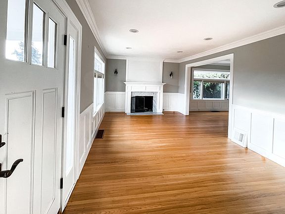 Main floor entrance with refinished hardwood floors.