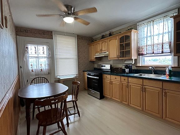 brand new appliances and door leads to private balcony