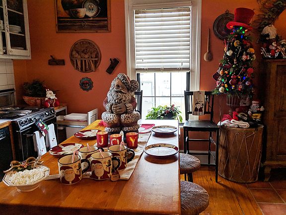 Kitchen nestled in home rear
