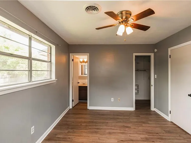 Master Bedroom Suite. Walk in closet on right. Bathroom on Left