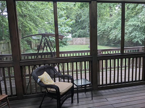 Upstairs screened porch view of backyard