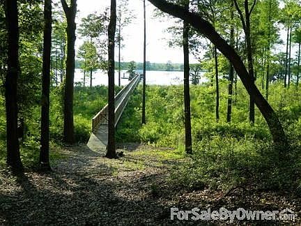 Homesite : View from homesite on high portion of land (approx. 3/4 acre) down dock to river