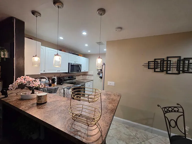 10046 Winding Lake Rd #202 — Photo 8
