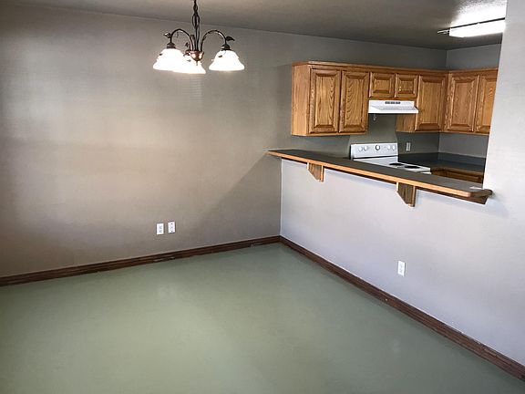 Open concept dining/kitchen/living areas