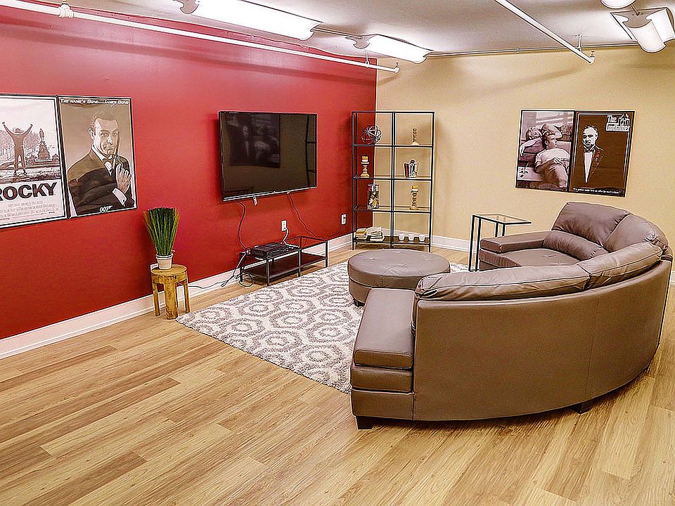 Embrace comfort in this chic living space, perfect for relaxation and entertainment.