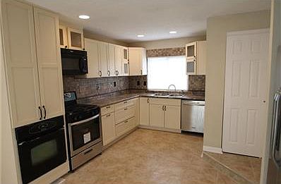A Kitchen fit for Any Cook. Built in Oven and a New Gas Range.