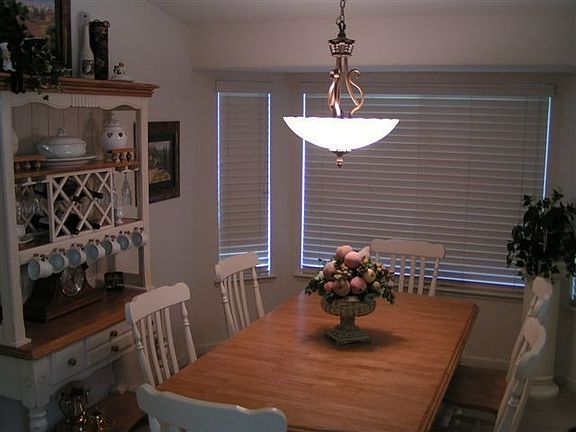 dining room with bay window