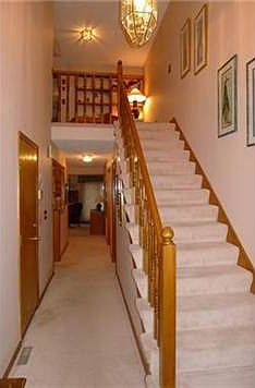 Entry provides privacy from living spaces