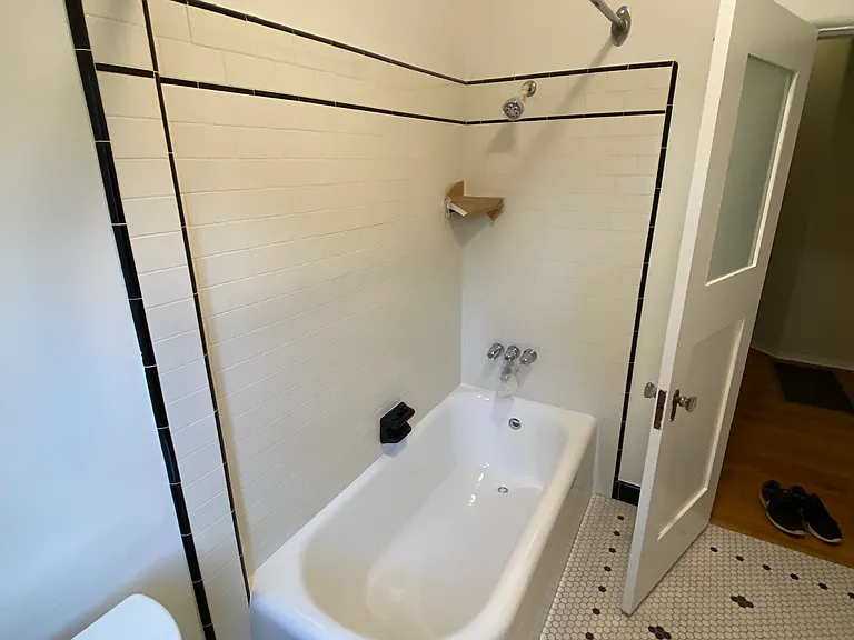 ORIGINAL REFINISHED CAST IRON AND CERAMIC SHOWER TUB