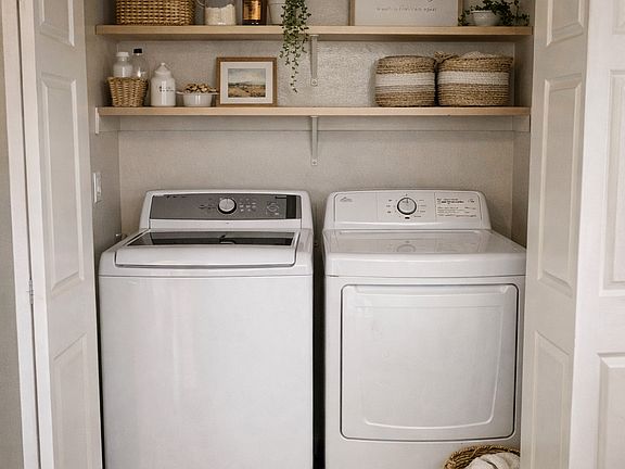 FULL SIZE WASHER AND DRYER OFF THE DINNIG AREA.