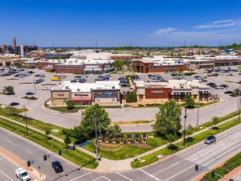 Discover the vibrant Legends Shopping Center, offering a diverse range of stores, dining options, and ample parking for a convenient shopping experience.
