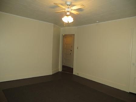 Living Room doorway looking toward hall and front apartment door