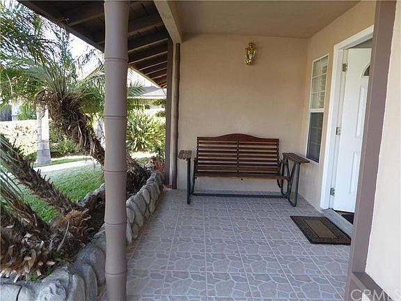 Front porch with tiled entry.