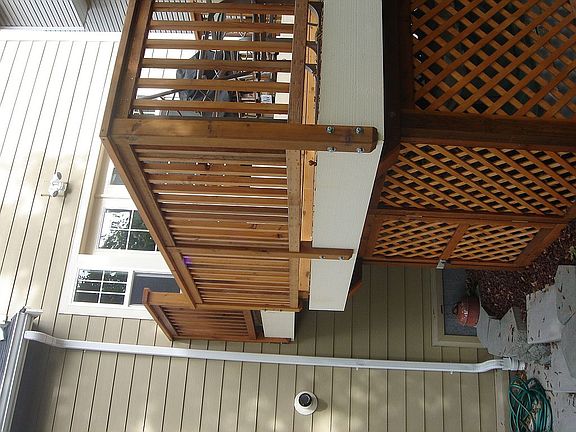 Deck, storage under deck and house.