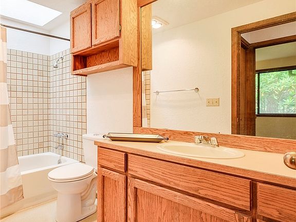 Main floor bathroom with an amazing sky light.