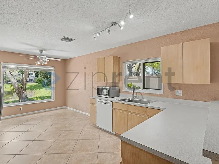 10271 NW 10th Ct — Photo 12