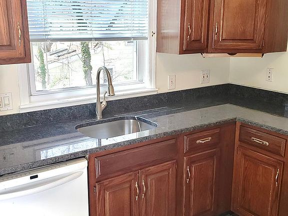 Kitchen with Dishwasher ... Eat at counter to right and large Dinning Room / Office Or both to the Right.... Nice... Plenty of Room !!!