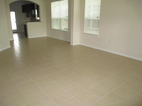 Large living room with ceramic tile!