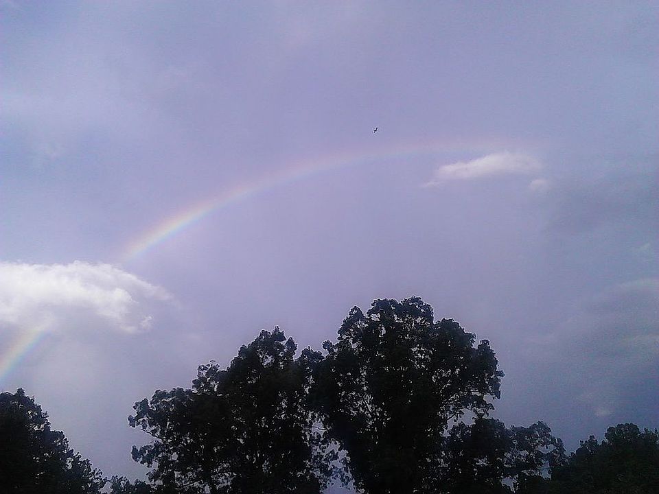 This picture was taken off our back deck. We see rainbows a lot.