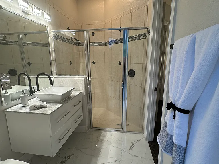 Bedroom #3 full bathroom (pool and side street access)