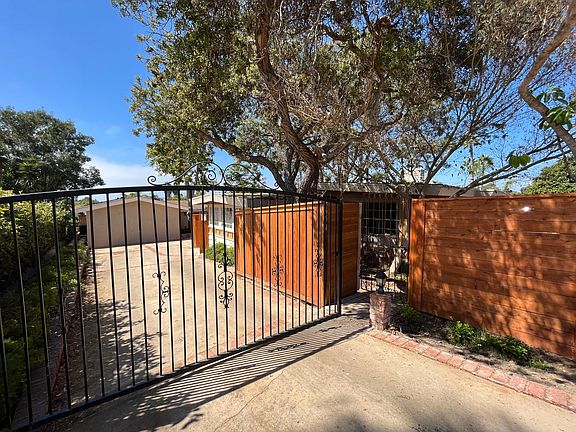 Private electric gated entrance with remote.