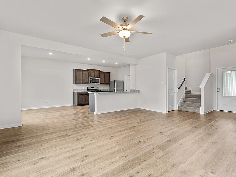 The large living room sits right off of the kitchen and dining room.