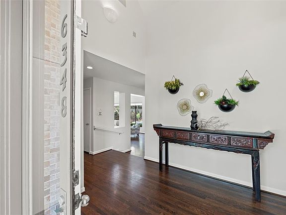 When entering the foyer you are greeted with high ceilings and an open floor plan