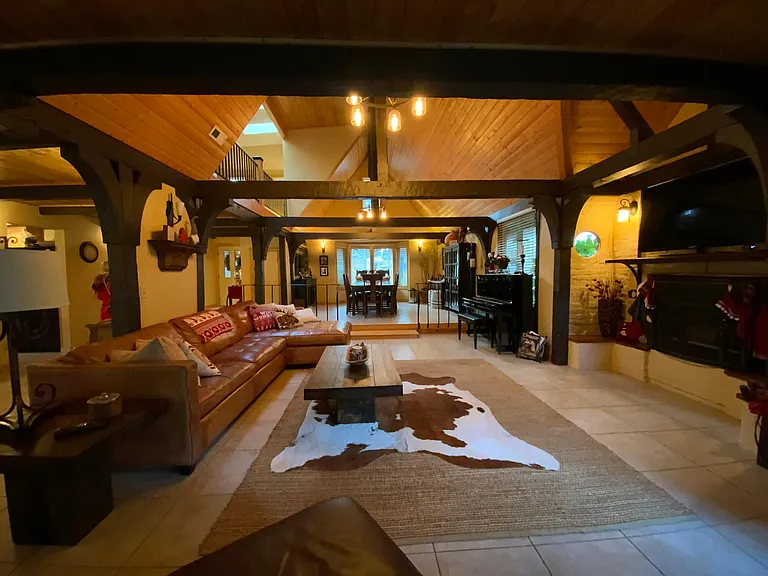 Living room area with inset gas fireplace.