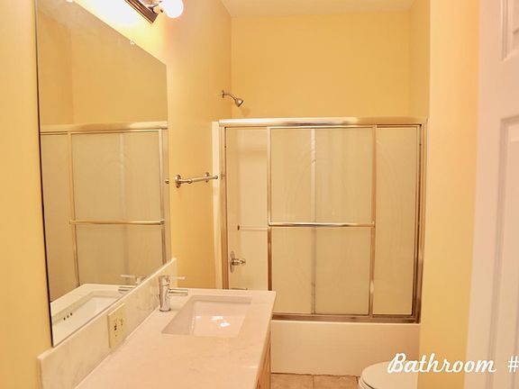 Bright bathroom #2 with full size bathtub