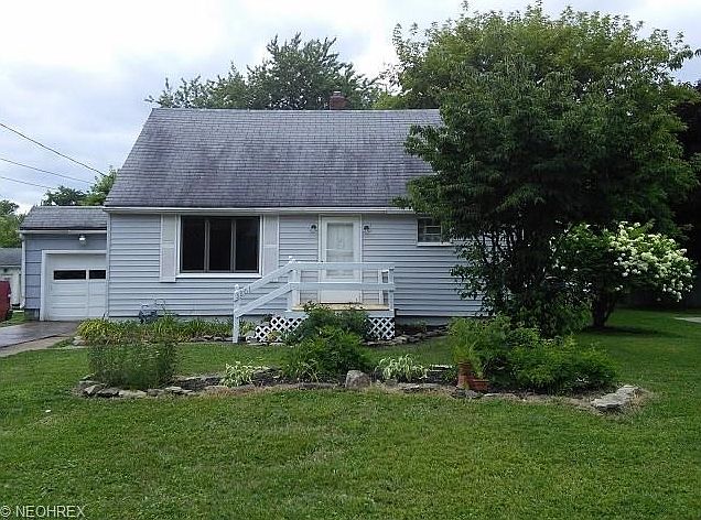 Great buckeye cape cod bigger than it looks  dormers in rear plus bonus room Dogwood tree and flower bush and some nice landscaping too  New deck in front