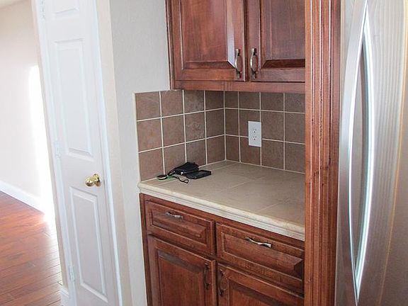 Upgrade cabinets and stainless steel appliances