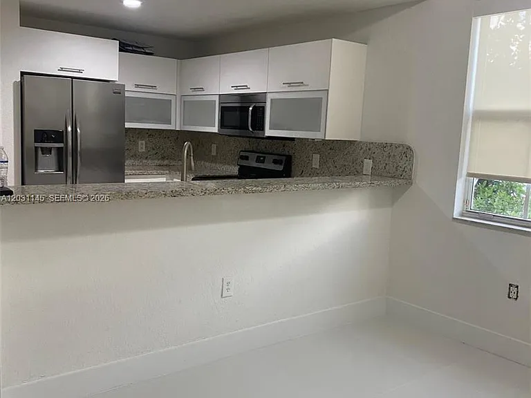 11201 NW 83rd St #202 — Photo 5