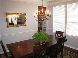 Formal dining room features crown and chairrail molding.