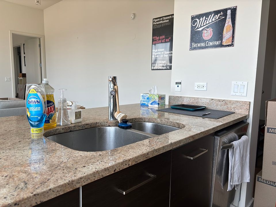 Granite Kitchen with dark finishes.