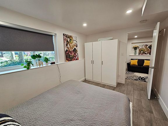 Bedroom with queen size bed.